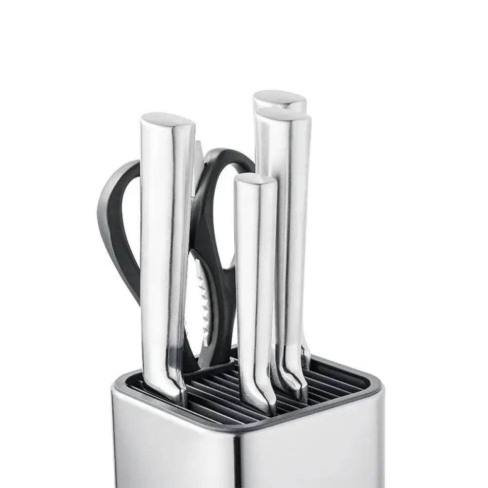 Modern stainless steel universal knife and utensil holder with sleek stainless steel knife set and matching block