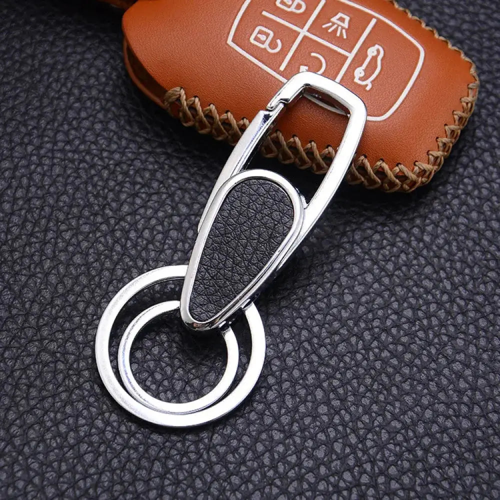 Premium leather and metal carabiner car keychain with silver double-ring and black leather accent