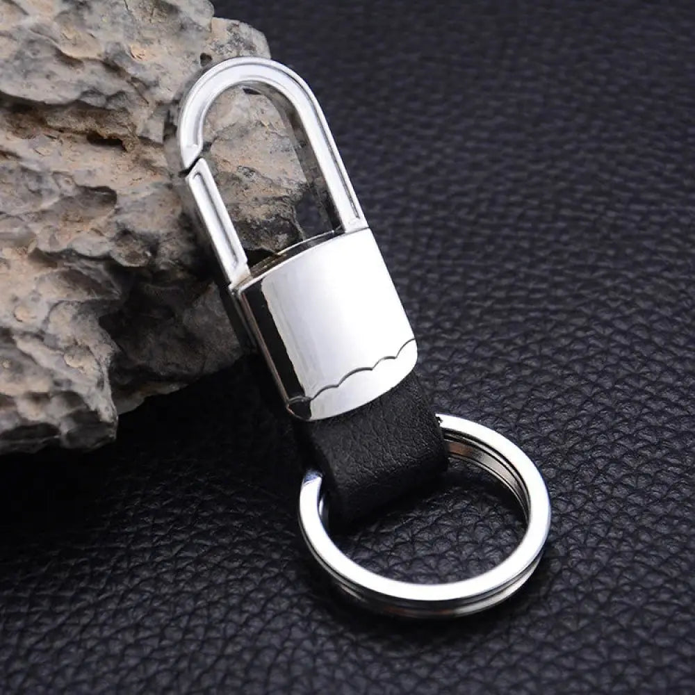 Premium leather and metal carabiner car keychain with silver-toned dual rings and black leather strap