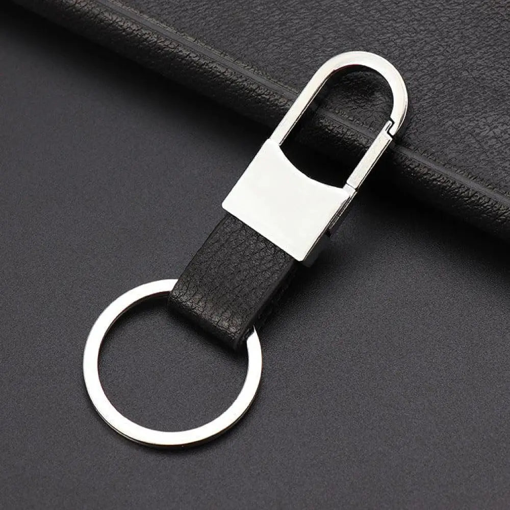 Black leather strap keychain with silver metal carabiner ring and clip for premium durable car key storage
