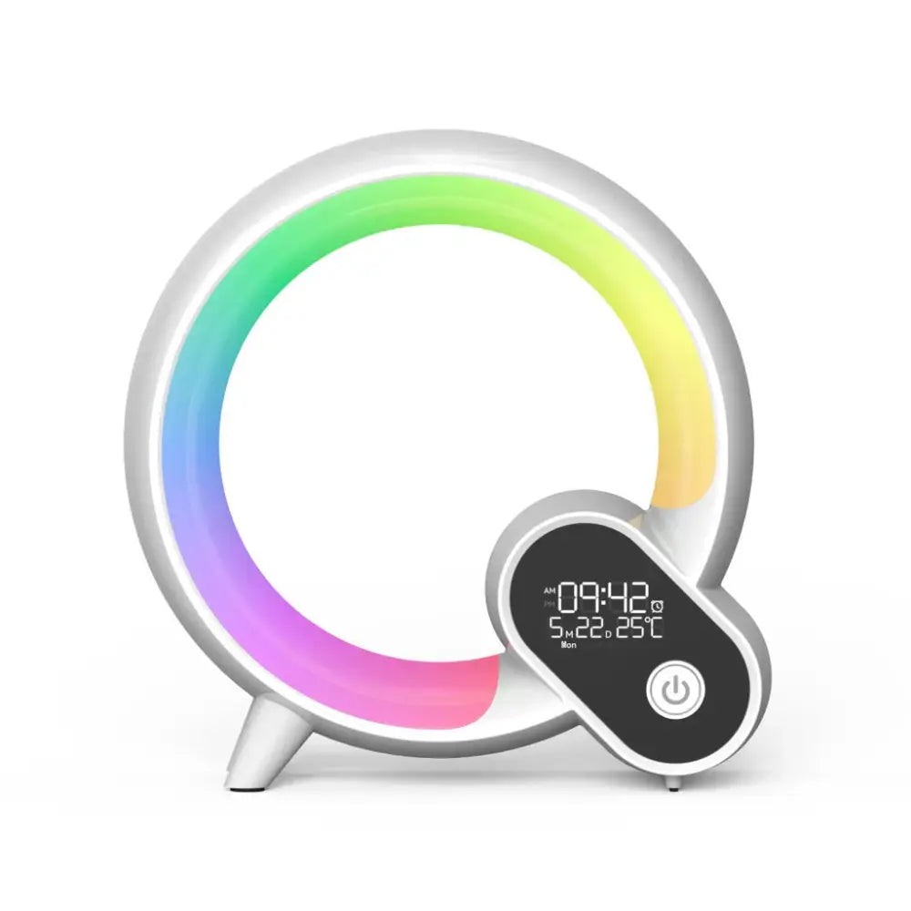 A sleek white circular q-light sunrise alarm clock with rainbow led ring and digital time date temperature display