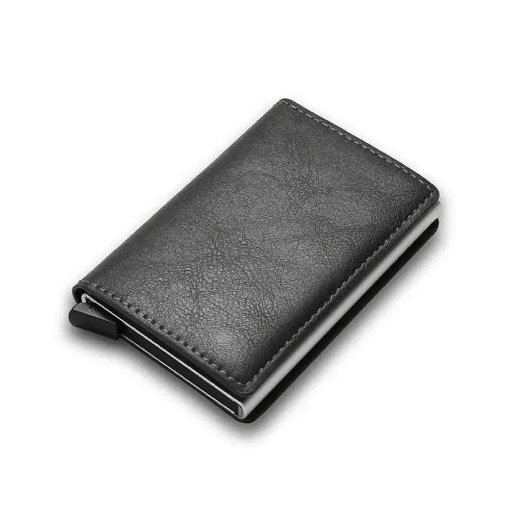 Black textured leather smart minimalist rfid carbon fiber card holder wallet with silver metal edges and magnetic closure