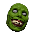 Green rubbery resin full face mask with wide toothy grin and glossy white eyes for creepy Halloween costume accessory