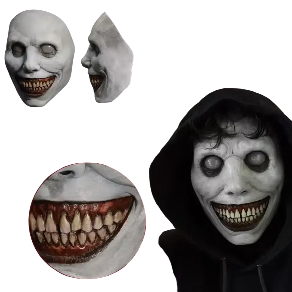 White latex full face horror mask with exaggerated wide grin sharp teeth and dark eye sockets for halloween costume