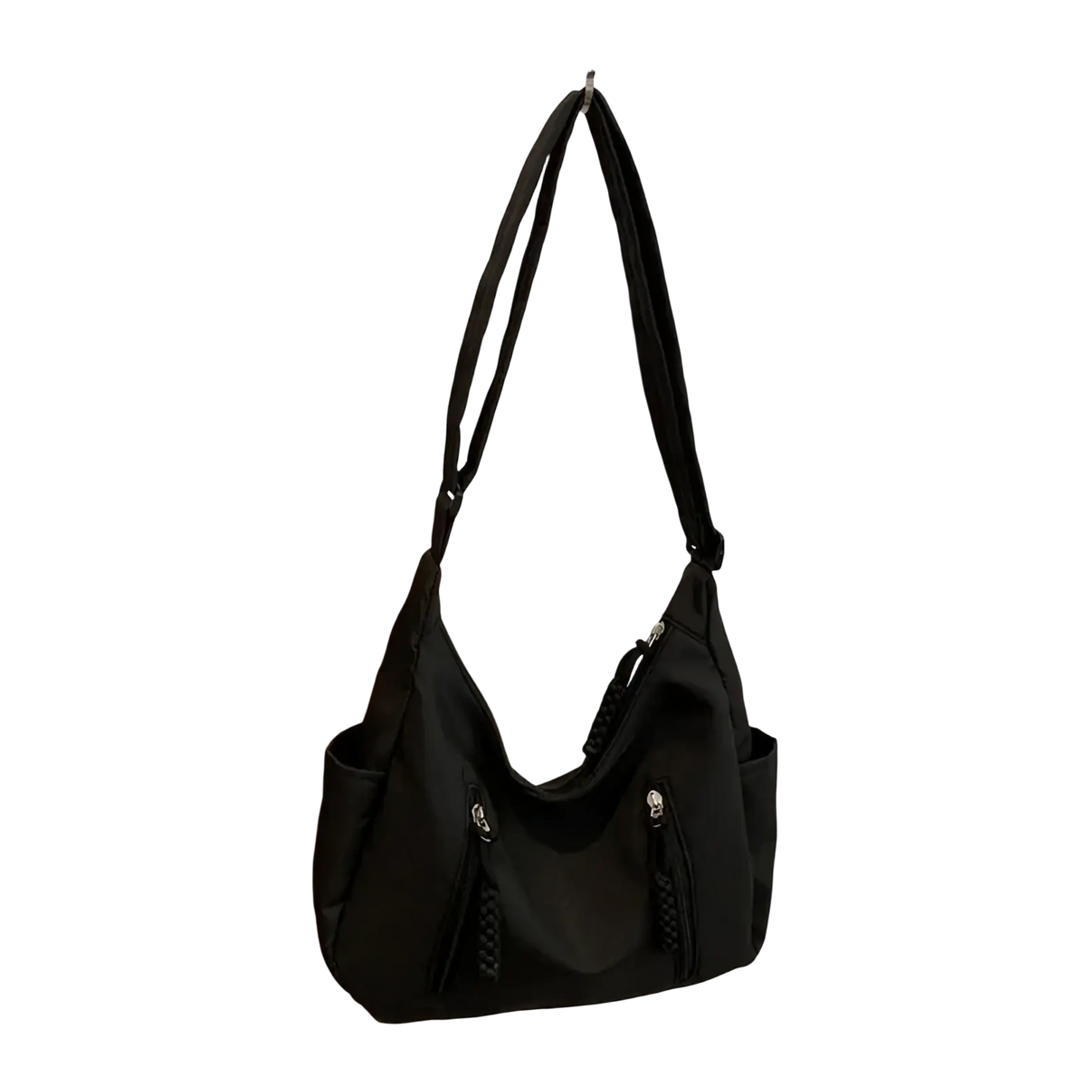 Black nylon crescent crossbody bag with braided tassels and zipper details lightweight shoulder tote