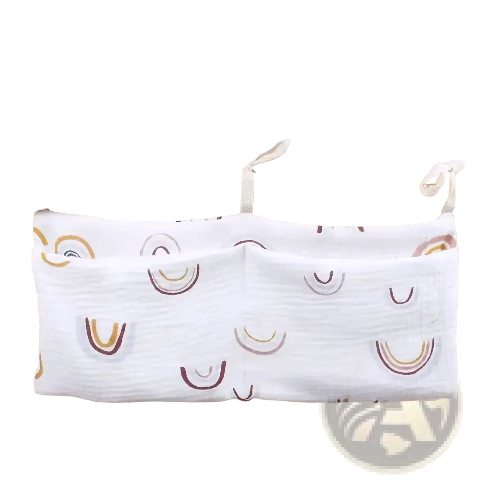 White cotton fabric crib storage bag diaper organizer with two pockets and soft gold and brown rainbow pattern