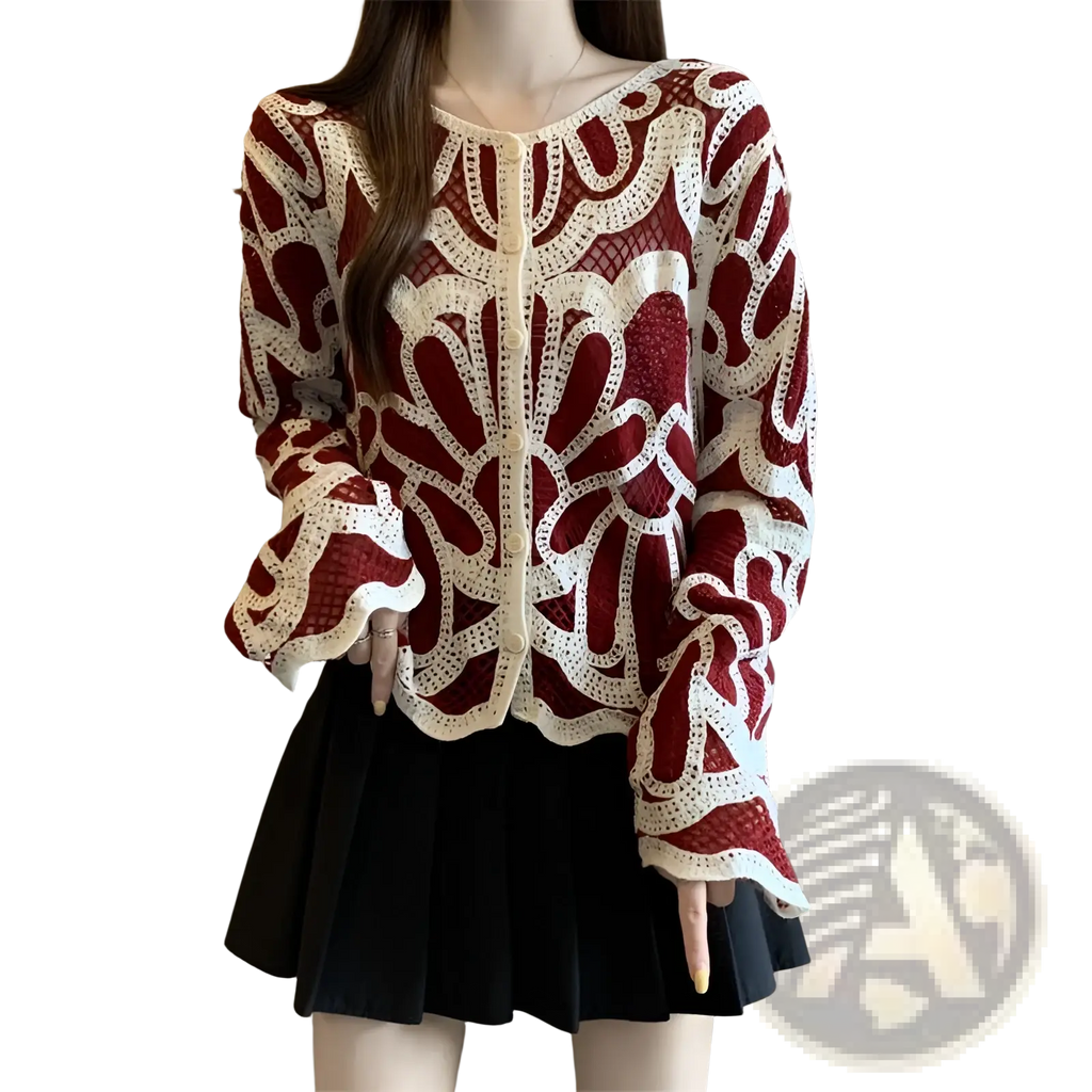 A maroon and cream crochet cardigan with intricate floral patterns and flared sleeves for a loose pullover top