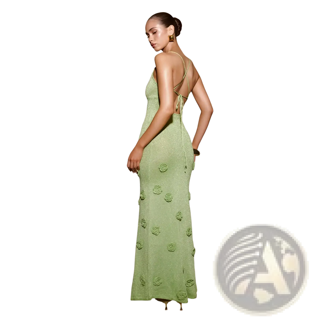 A mint green crochet floral lace mermaid maxi dress with raised appliqués and delicate spaghetti straps