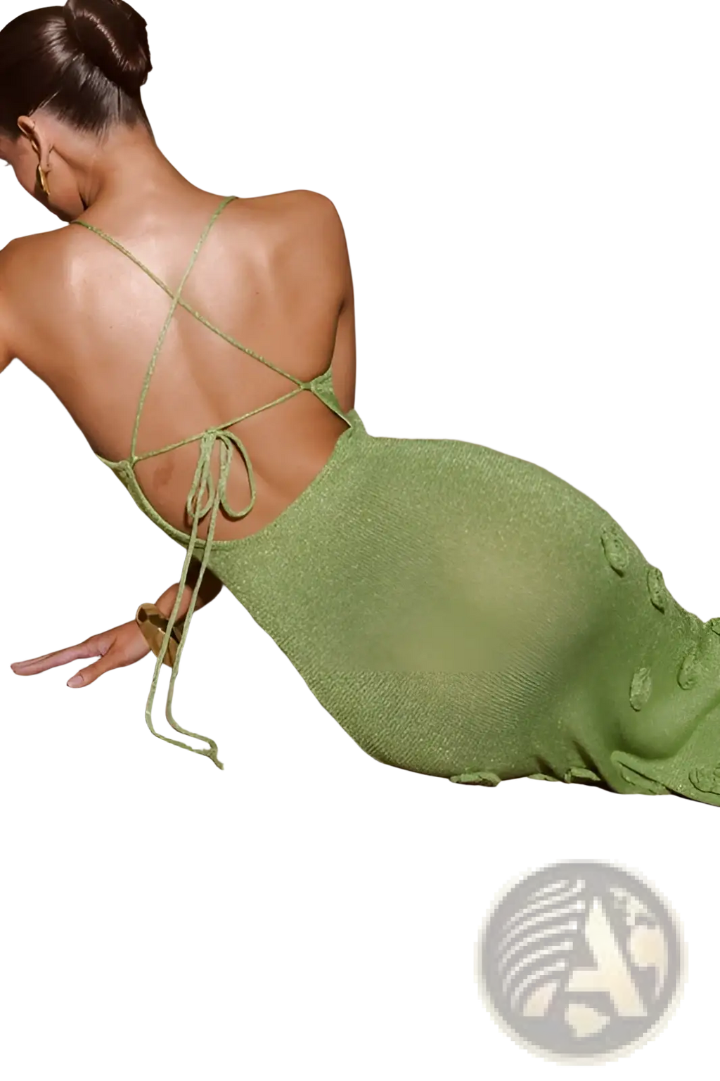 A shimmering sage green knit crochet floral lace mermaid maxi dress with a back crisscross tie and glitter accents