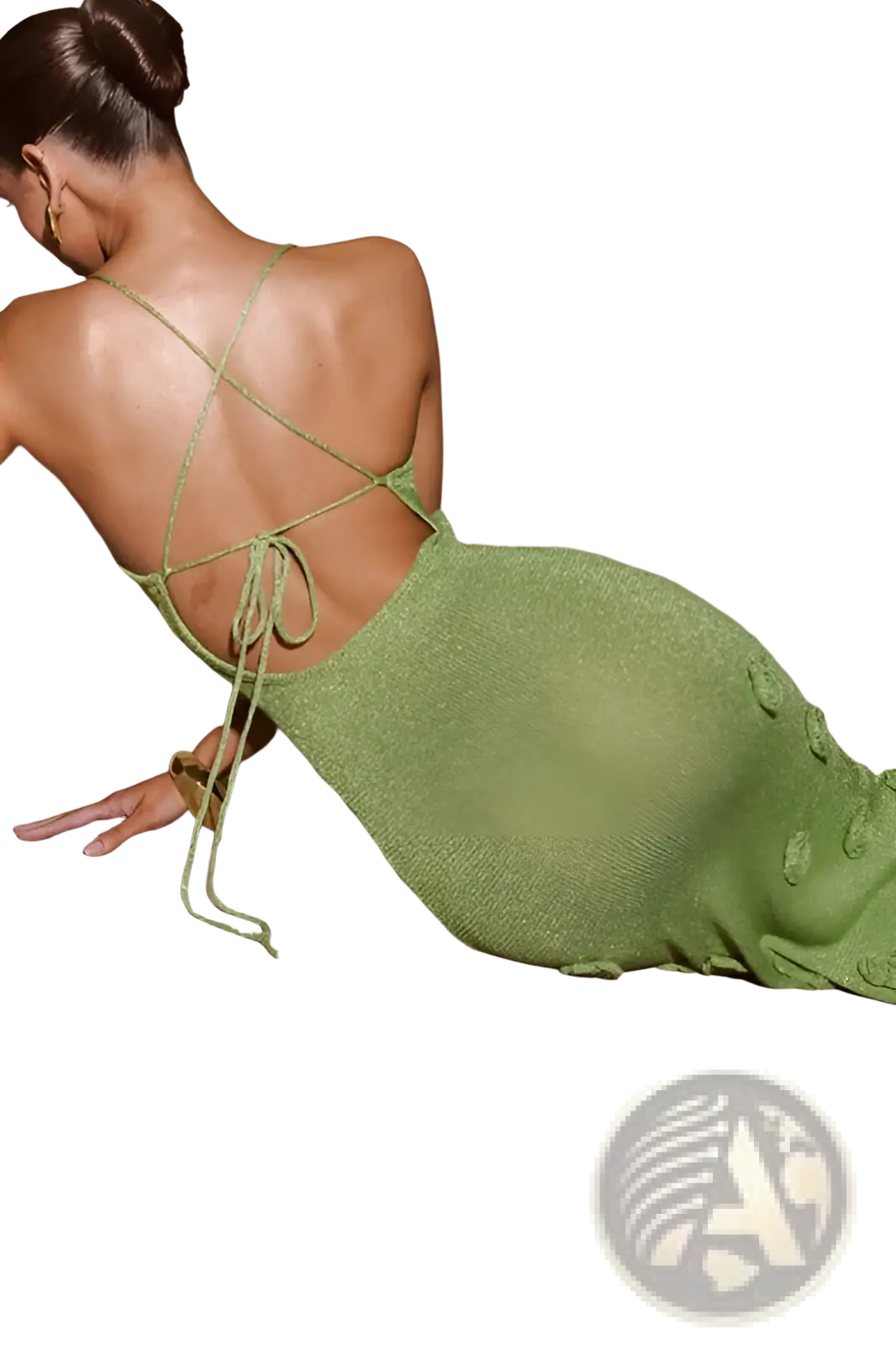 A shimmering sage green knit crochet floral lace mermaid maxi dress with a back crisscross tie and glitter accents