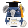 Blue crocheted elephant graduation keepsake wearing a black cap holding a card with a congratulatory message