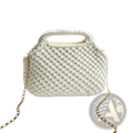 White crocheted knit shoulder bag with textured woven pattern and gold-toned chain strap tote purse