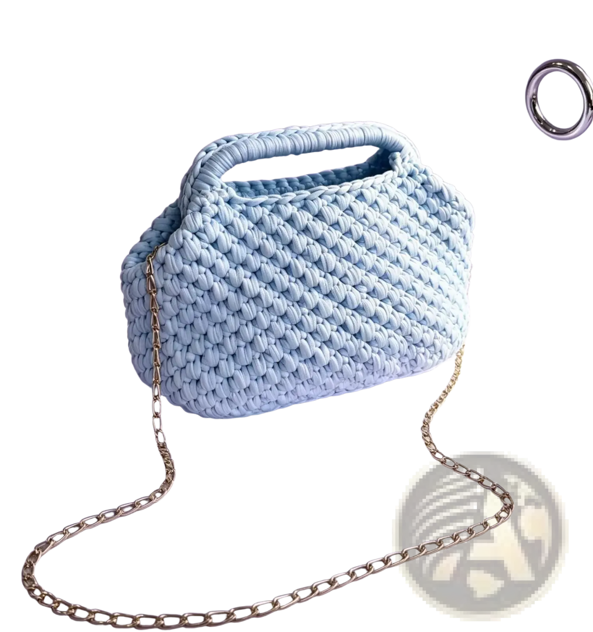 Light blue crocheted knit shoulder bag with textured woven pattern and gold-toned chain strap tote purse