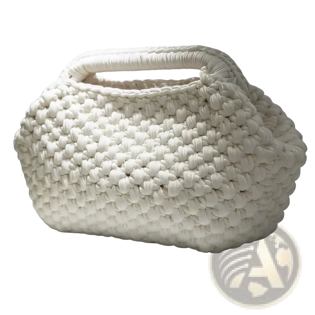A chunky white crocheted knit shoulder bag with a rounded puffy shape and matching handle woven tote purse