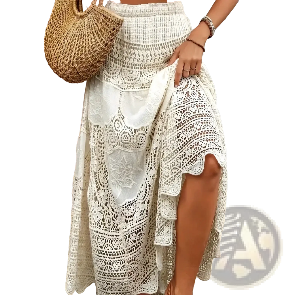 A flowing off-white crochet lace maxi skirt with intricate patterns and a high waist perfect for summer wear