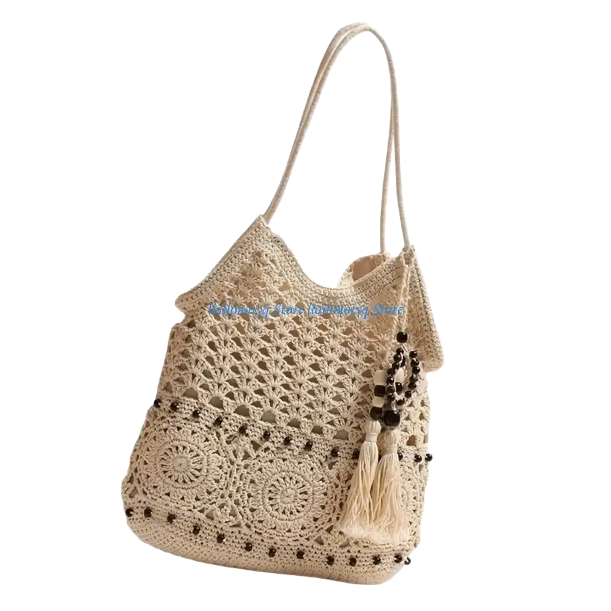 Beige crocheted shoulder tote bag with intricate lace patterns dark bead accents and tassel detail for beach use