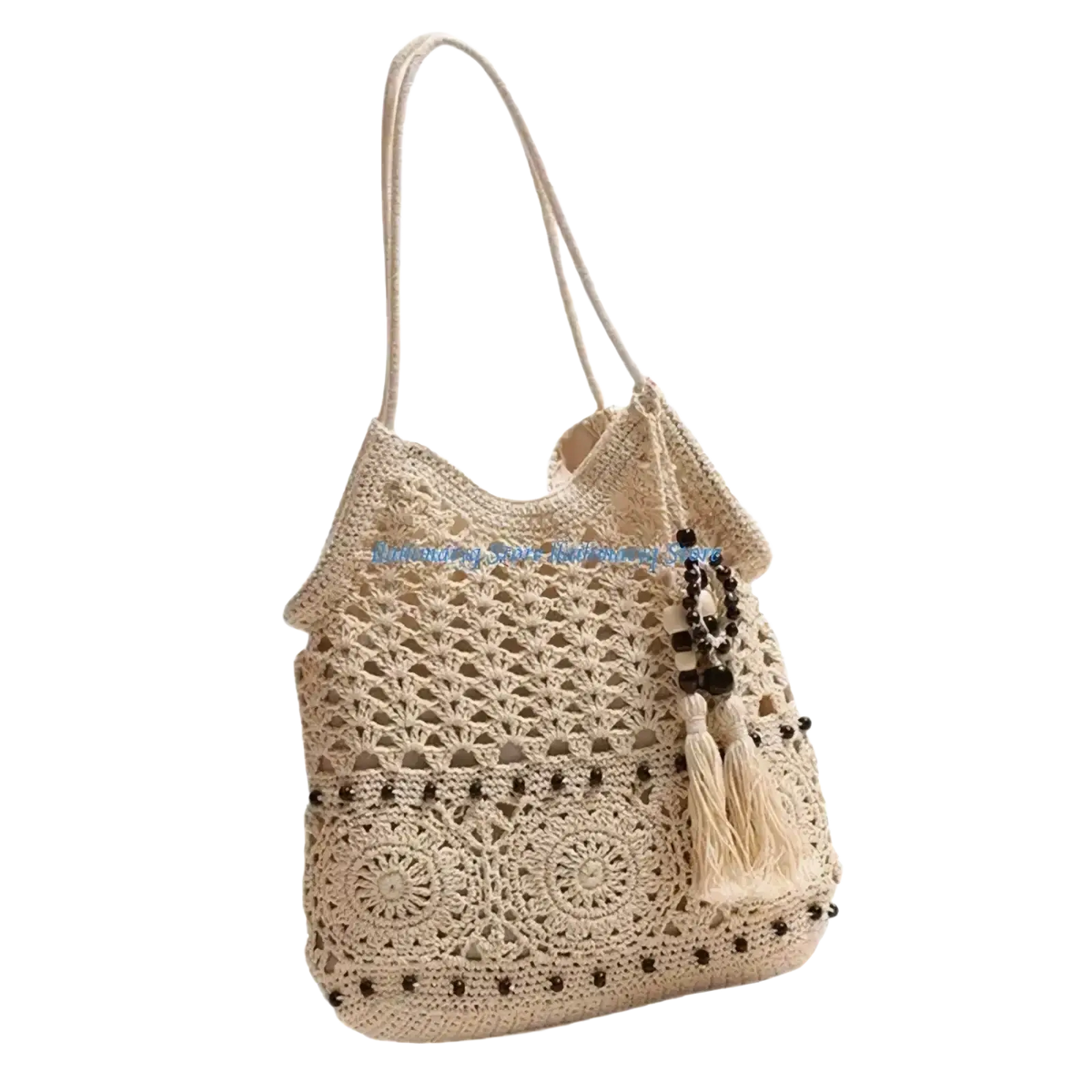 Beige crocheted shoulder tote bag with intricate lace patterns dark bead accents and tassel detail woven beach purse