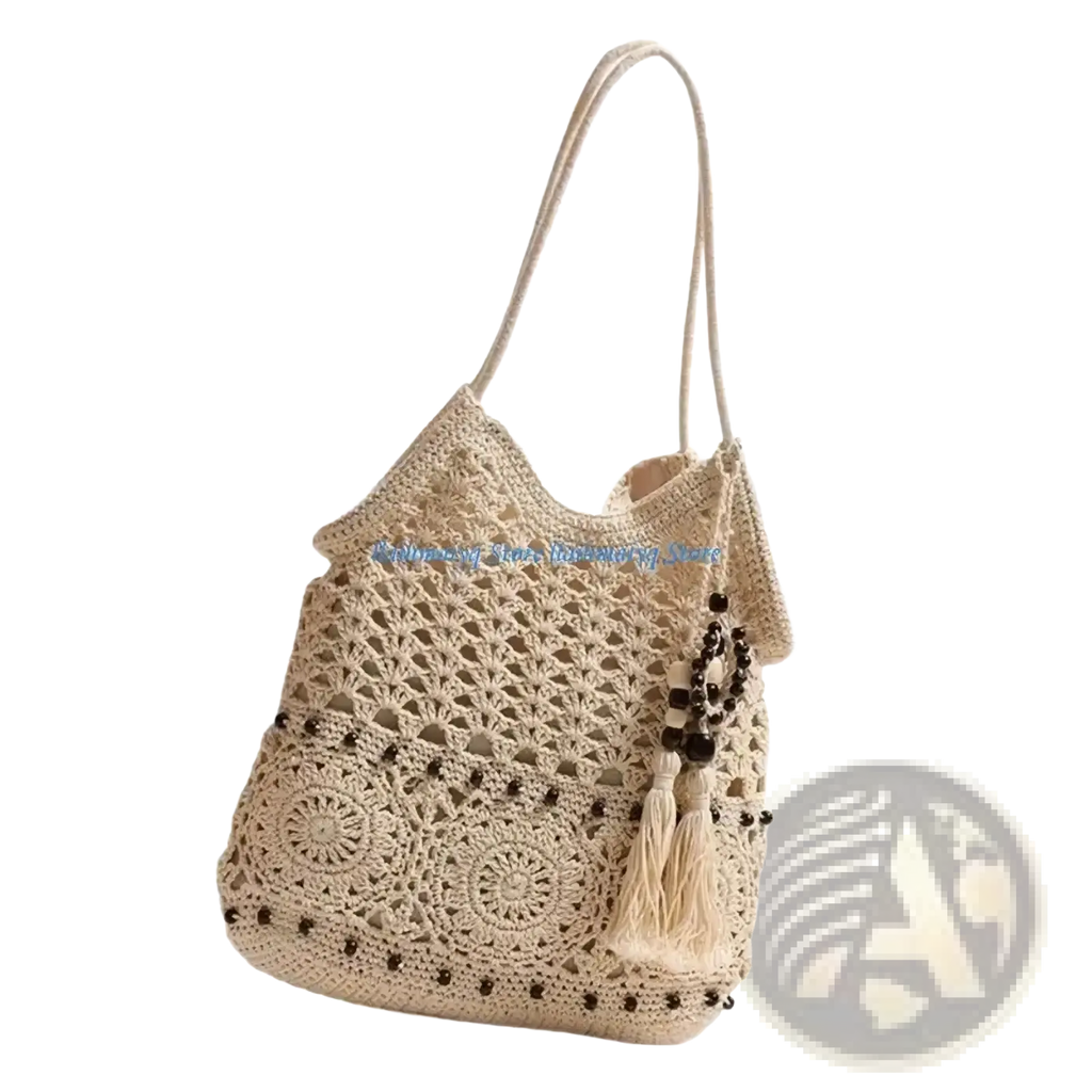 Beige crocheted shoulder tote bag with intricate lace patterns dark bead accents and tassel detail for beach use