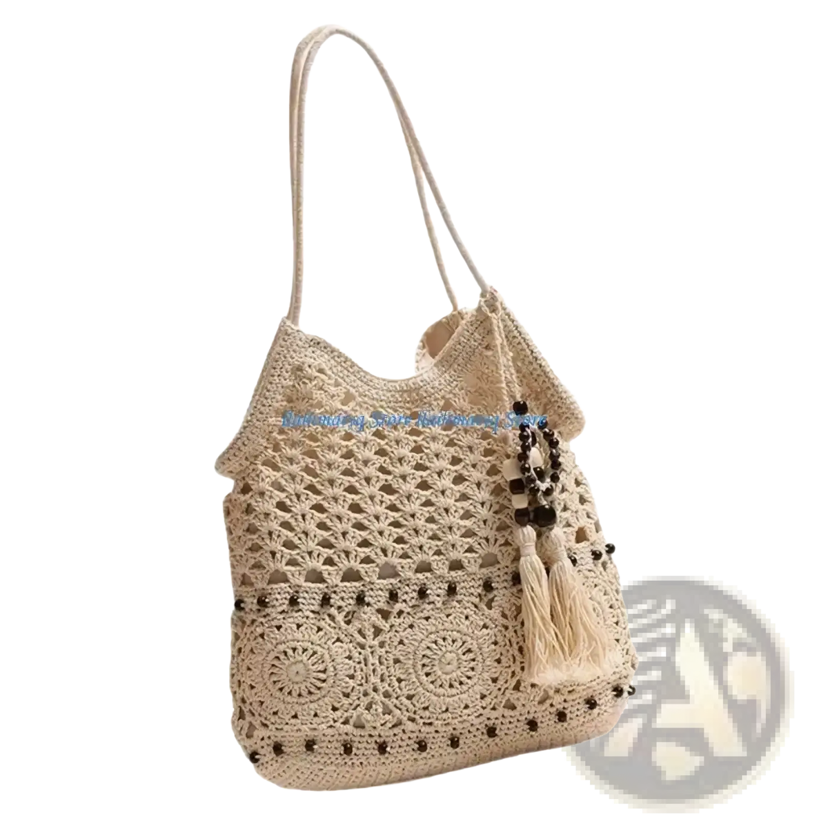 Beige crocheted shoulder tote bag with intricate lace patterns dark bead accents and tassel detail woven beach purse