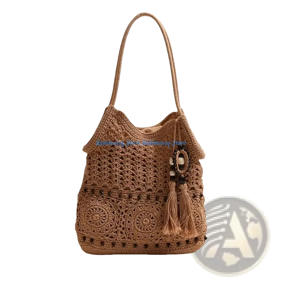 A tan crocheted shoulder bag with intricate circular patterns and a decorative tassel woven for beach use