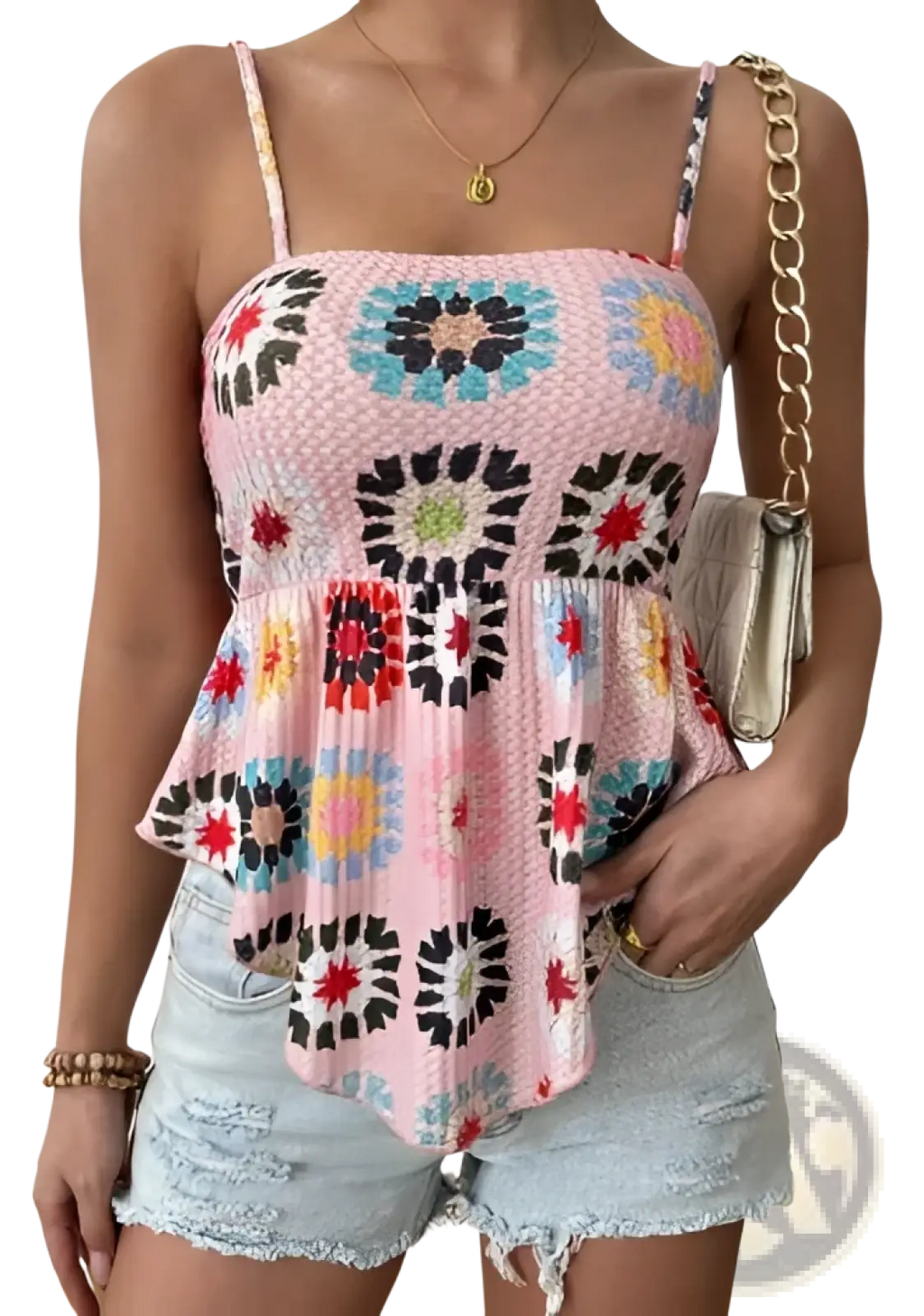 Pink crocheted peplum camisole top with thin straps featuring colorful floral patterns and intricate crochet detailing