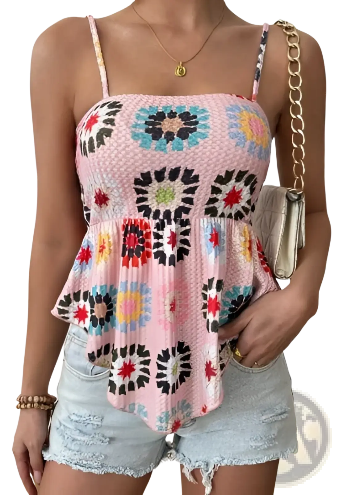 Pink crocheted peplum camisole top with thin straps featuring colorful floral patterns and intricate crochet detailing