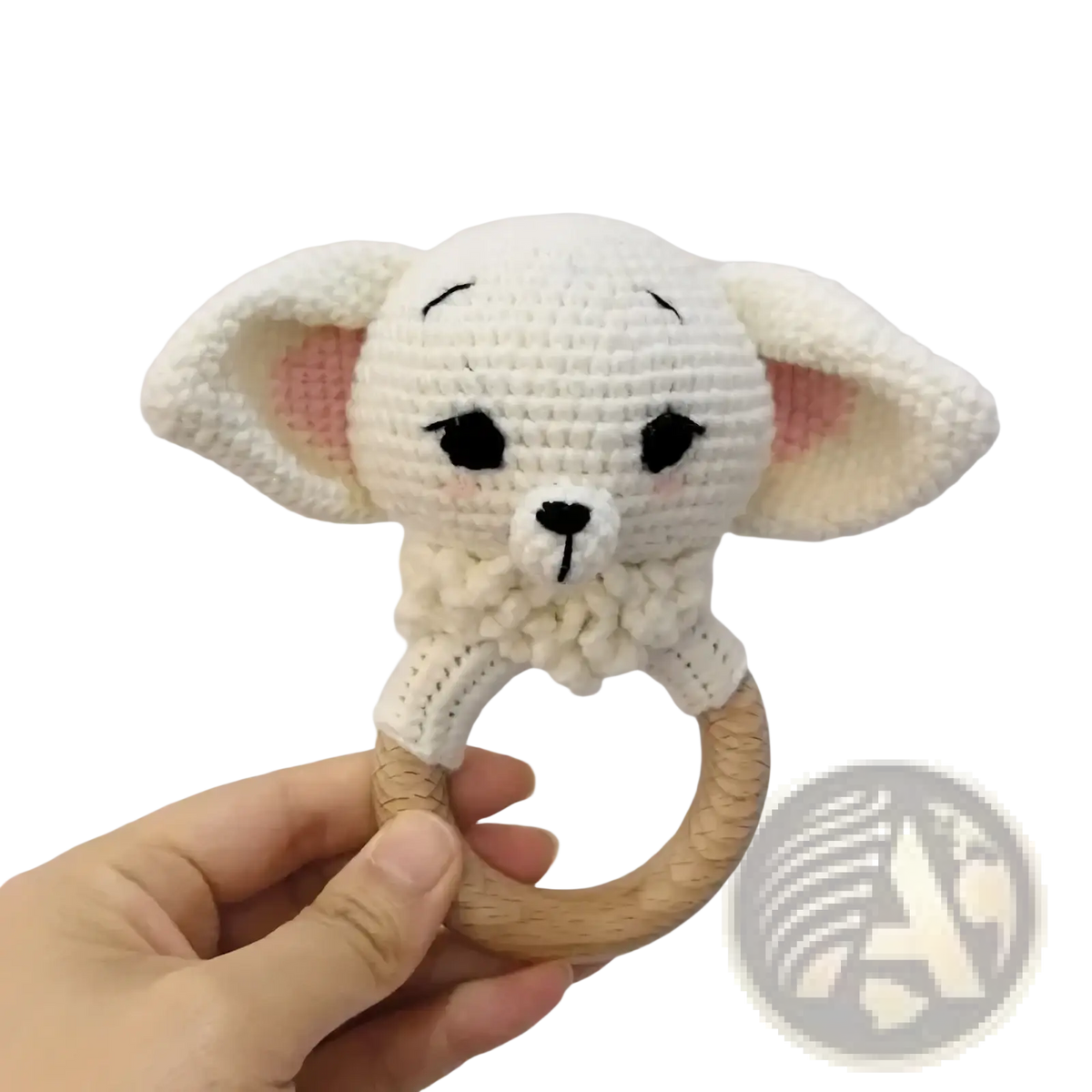 White crocheted puppy rattle with wooden ring handle and pink inner ears for the crocheted unicorn baby comforter security blanket
