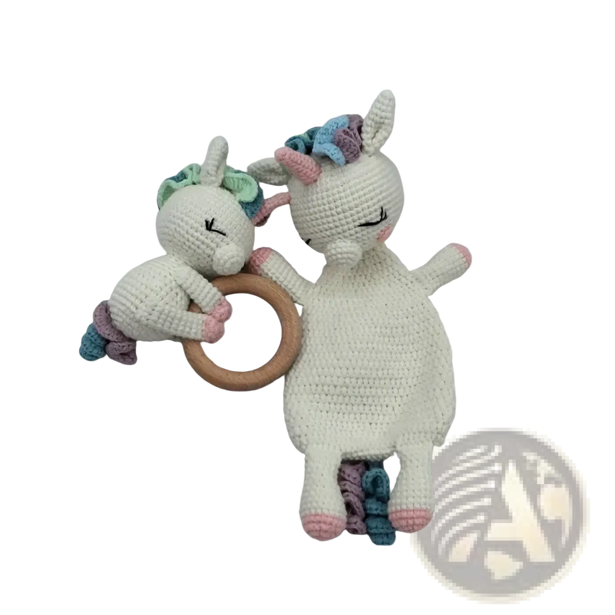 Crocheted unicorn baby comforter security blanket with white yarn, pastel rainbow mane, pink hooves, and wooden teething ring