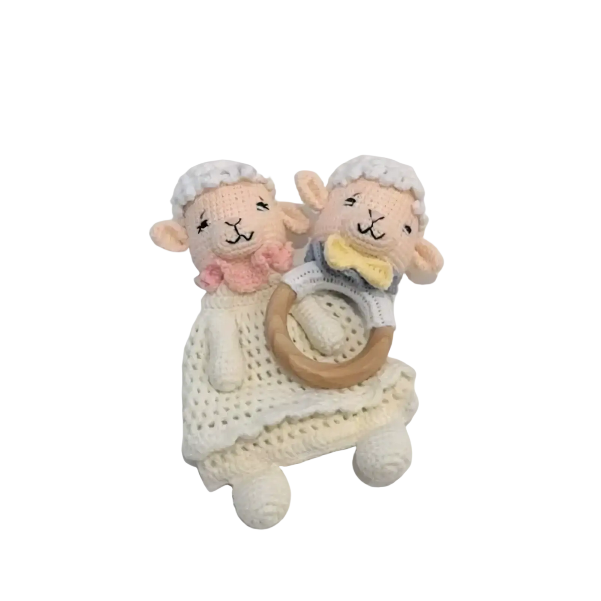 Crocheted unicorn baby comforter security blanket with cream-colored sheep teethers holding a wooden ring