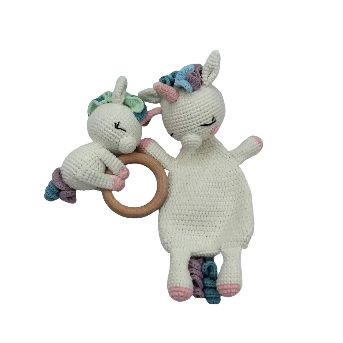 Crocheted unicorn baby comforter security blanket with white yarn, pastel rainbow mane, pink hooves, and wooden teething ring