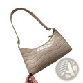 Beige crocodile embossed pu leather crescent messenger bag with gold tone hardware and curved shoulder strap