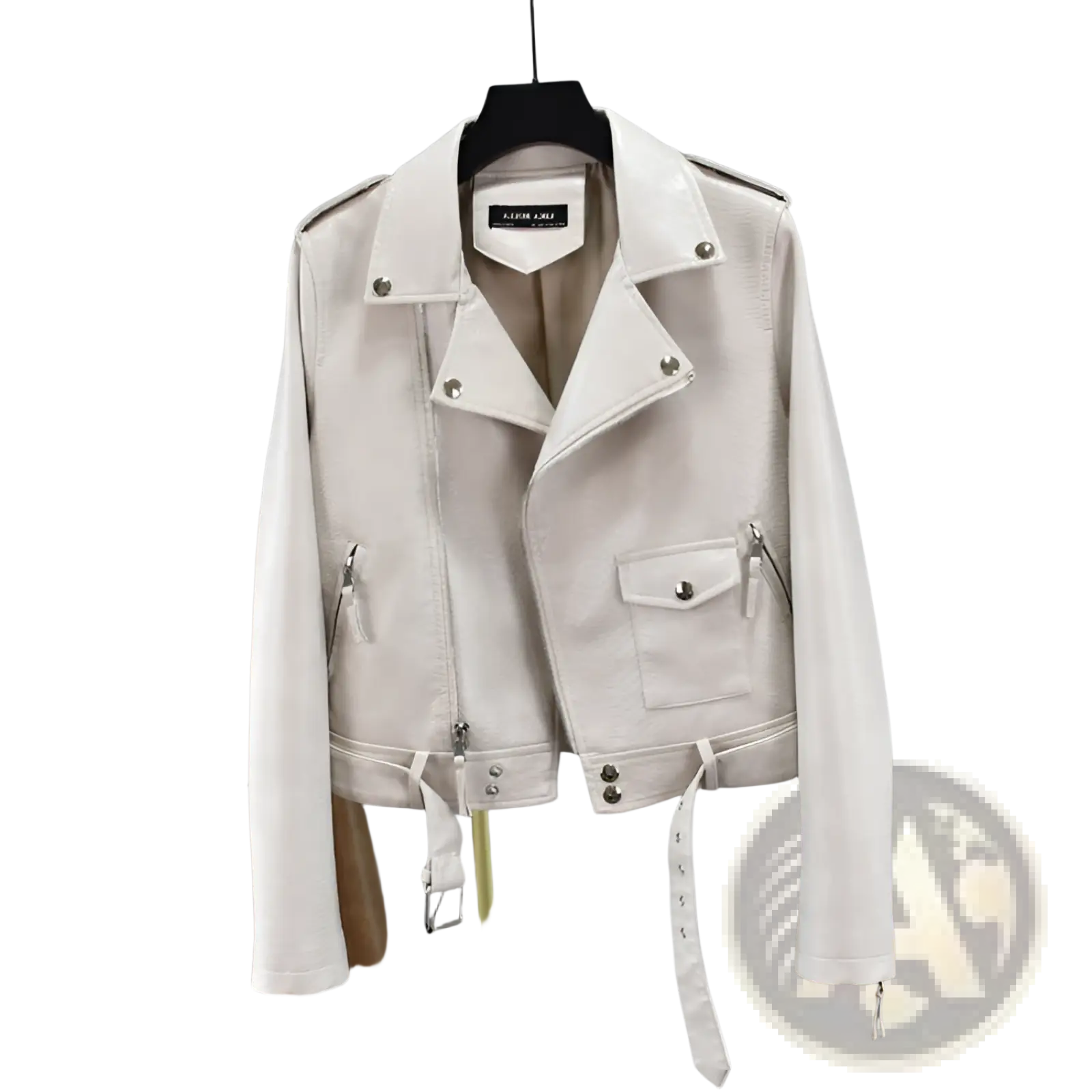 A cream-colored crocodile faux leather cropped biker jacket with silver hardware and a belted waist