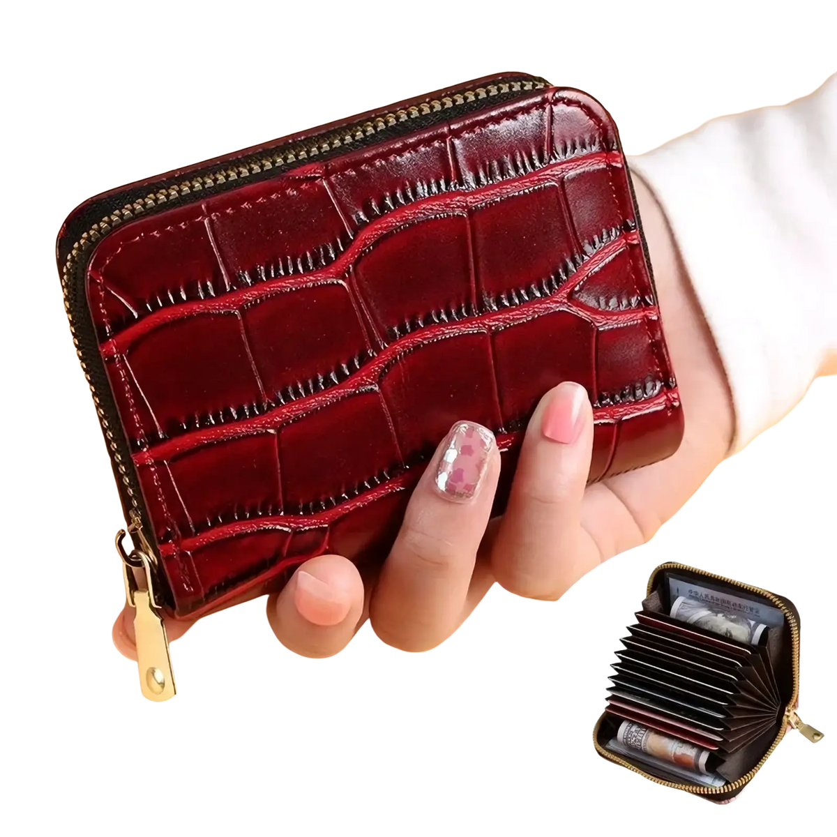 A glossy burgundy crocodile leather accordion card holder wallet with a gold zipper and pull tab