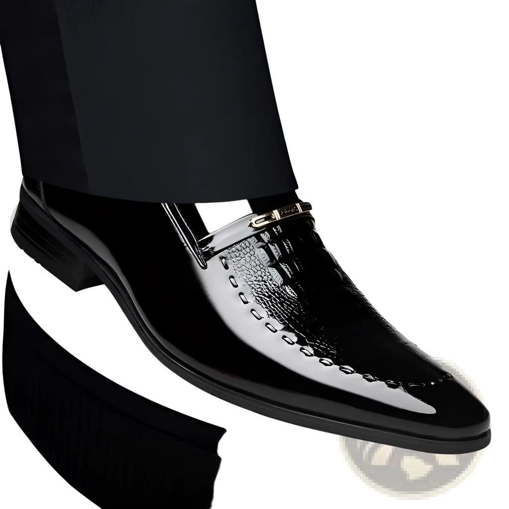 Black patent leather men’s loafer with glossy crocodile-embossed toe cap and gold-tone metal buckle detail