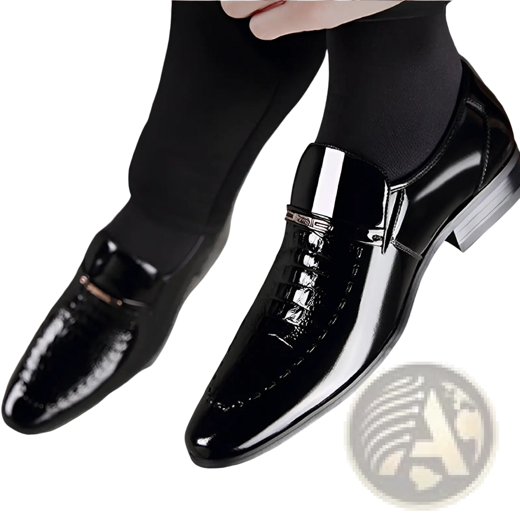 Black patent leather men’s loafers with crocodile texture toe cap and metallic buckle detail