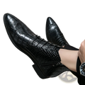 Black crocodile-patterned leather lace-up ankle boots with pointed toe and side zipper for stylish wear