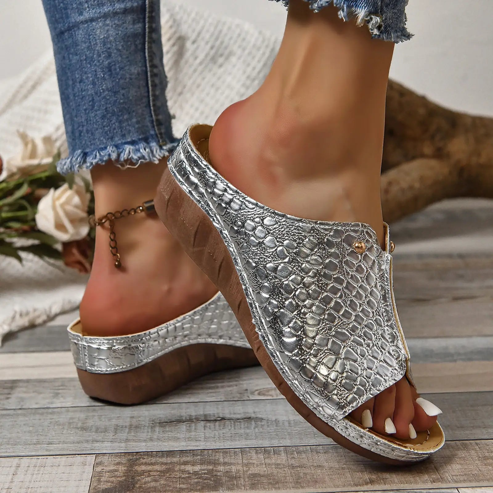Silver crocodile-patterned slide-on platform wedge sandals for women with a brown rubber sole