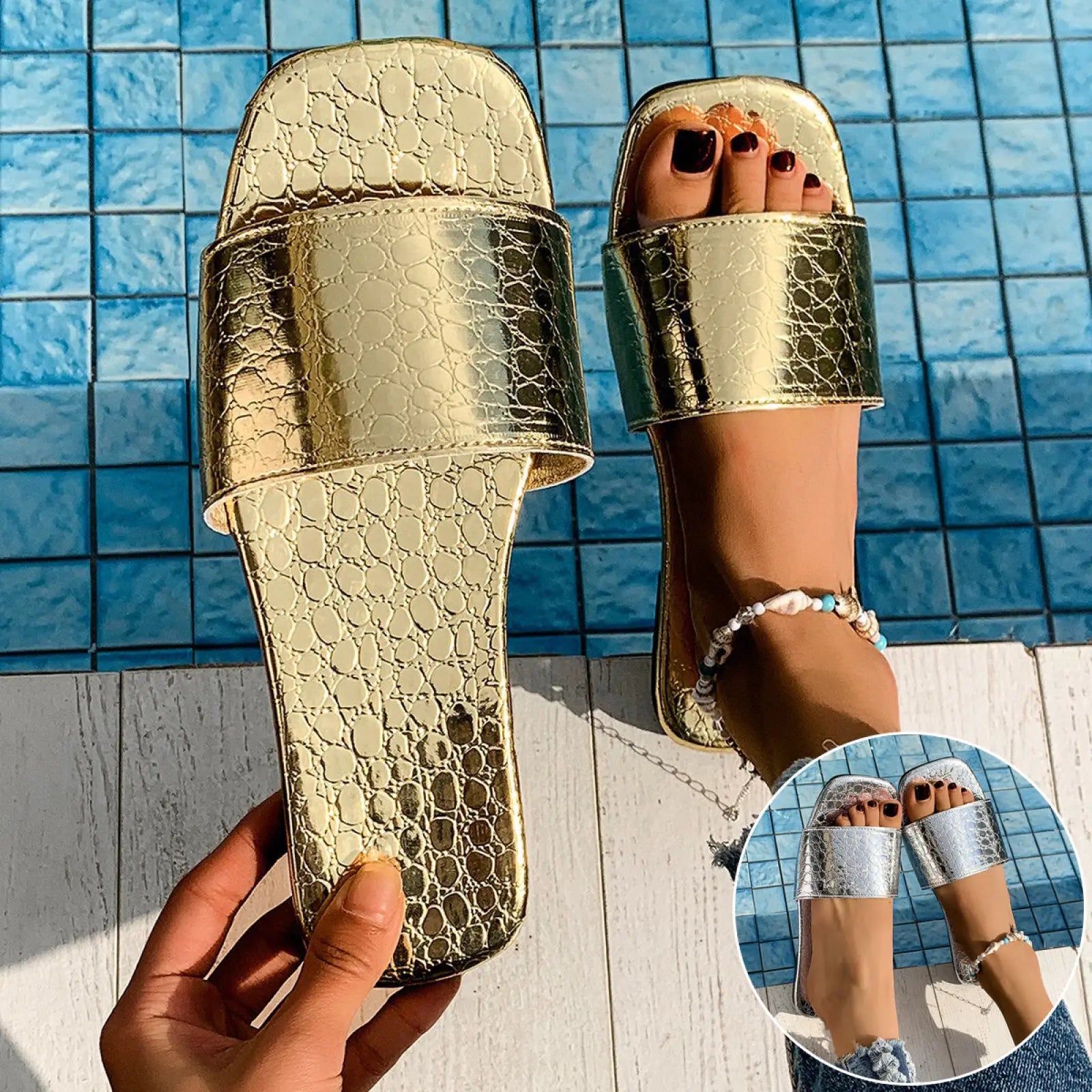 Gold-colored crocodile-textured square toe flat slide sandals with a shiny metallic finish for beachwear