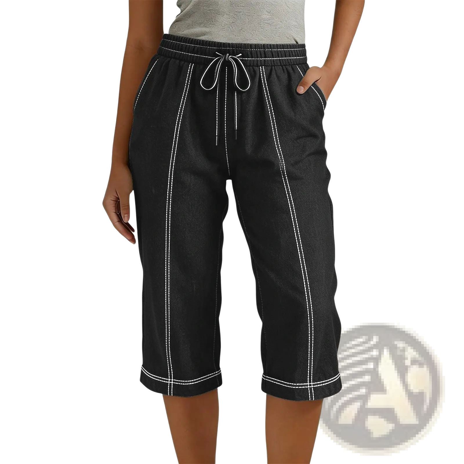 Black cropped drawstring pants with white side stitching, elastic waistband, and loose casual fit for women