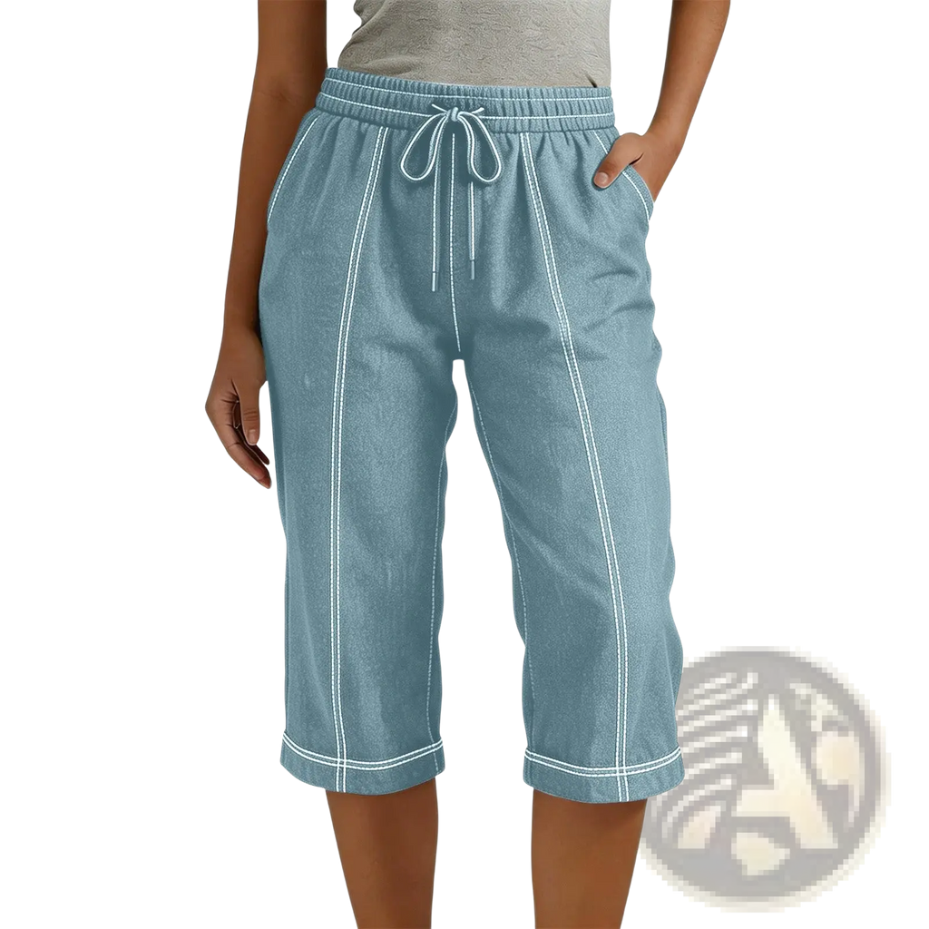 Light blue denim cropped drawstring pants with white stitching and loose fit for casual women’s wear