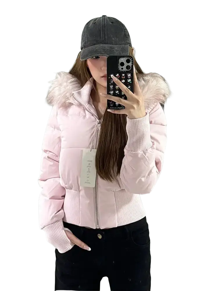 Pink cropped puffer jacket with fluffy fur-lined hood and ribbed cuffs designed for warmth and style