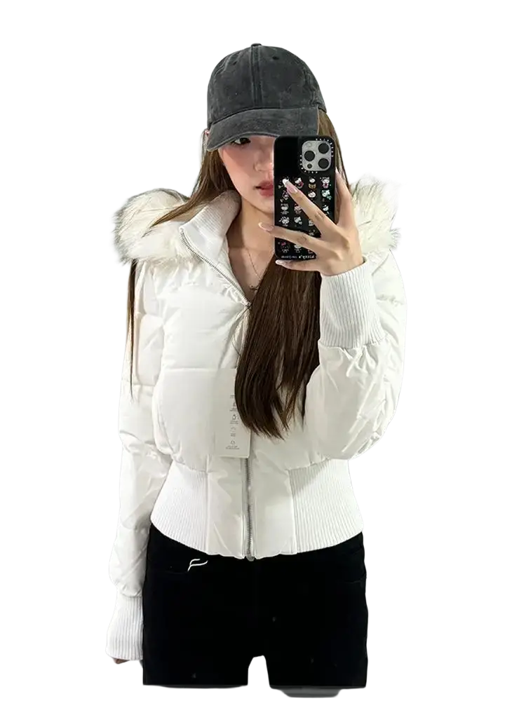 White cropped puffer jacket with fluffy fur-lined hood and ribbed cuffs for warmth and style