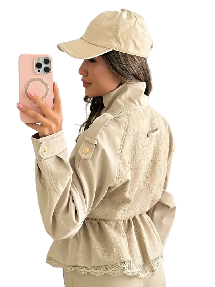 Beige cropped lace hem trench jacket featuring lace trim peplum waist and gold tone buttons