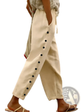 Cream-colored cotton cropped patchwork casual pants with relaxed fit navy side buttons and red hem trim