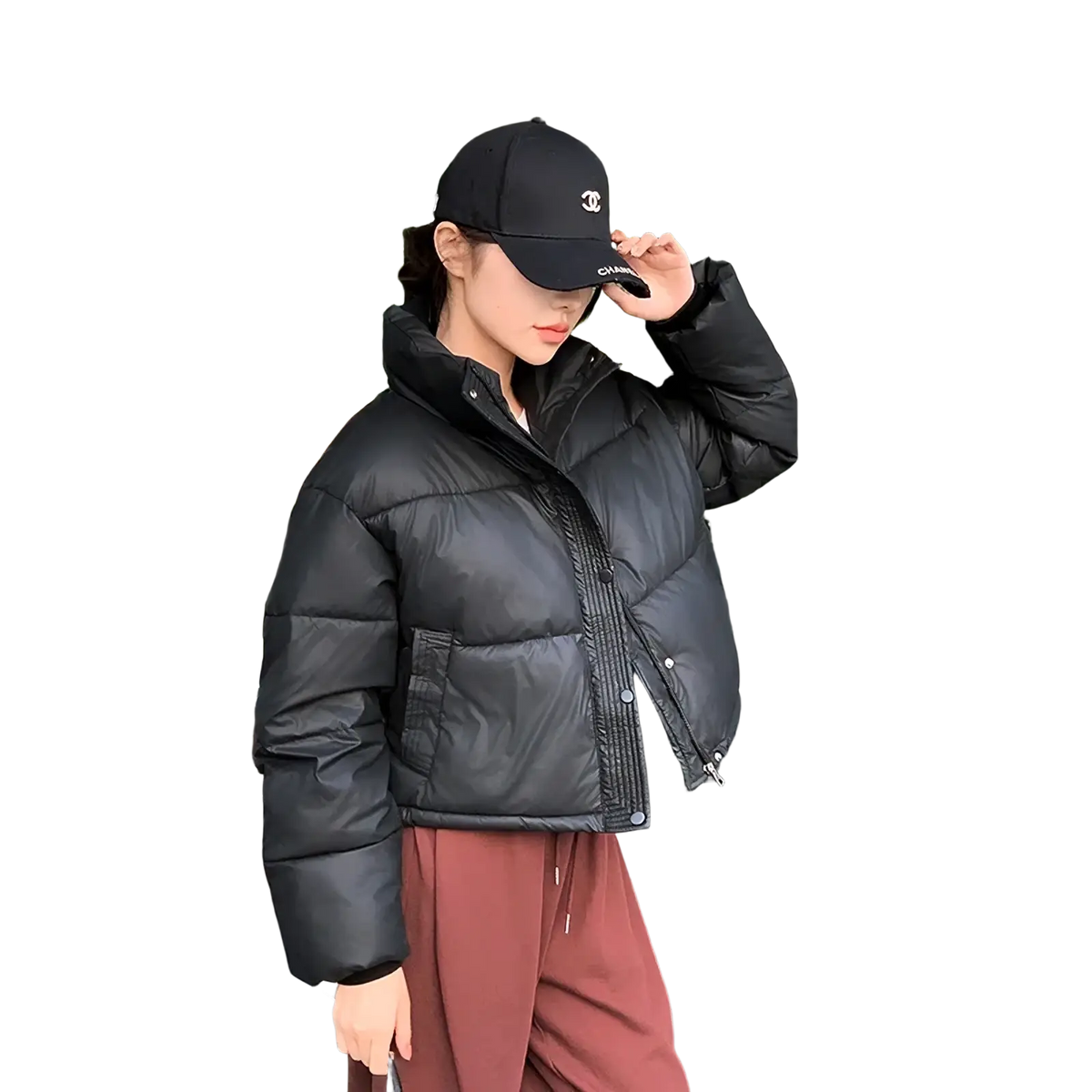 Black cropped puffer jacket with quilted design and front zipper closure for winter warmth and style