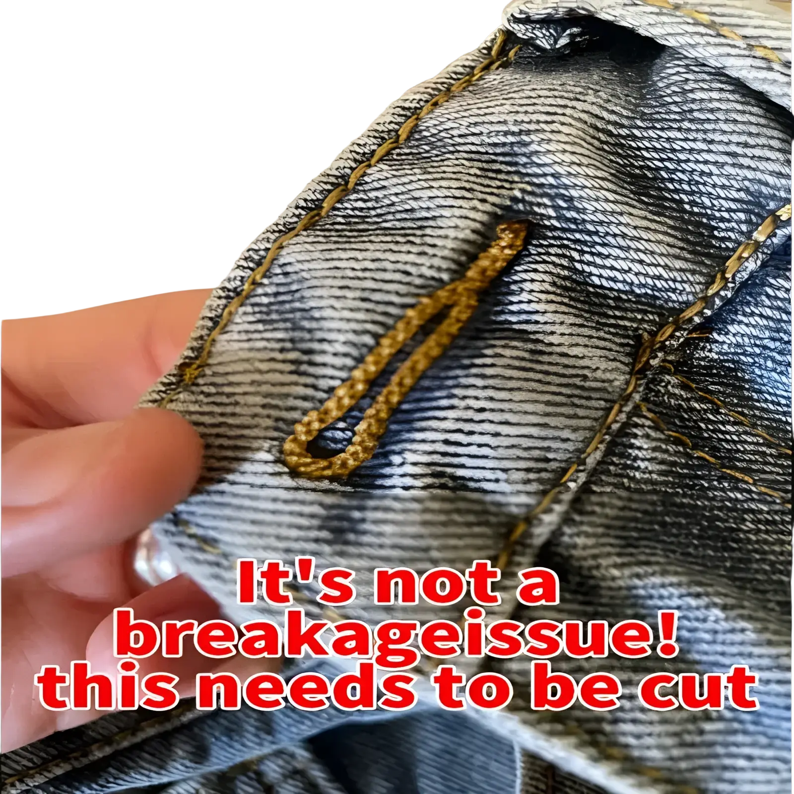 A close-up of the back pocket on faded blue denim cross embroidered baggy wide leg jeans with yellow stitching and leather tab