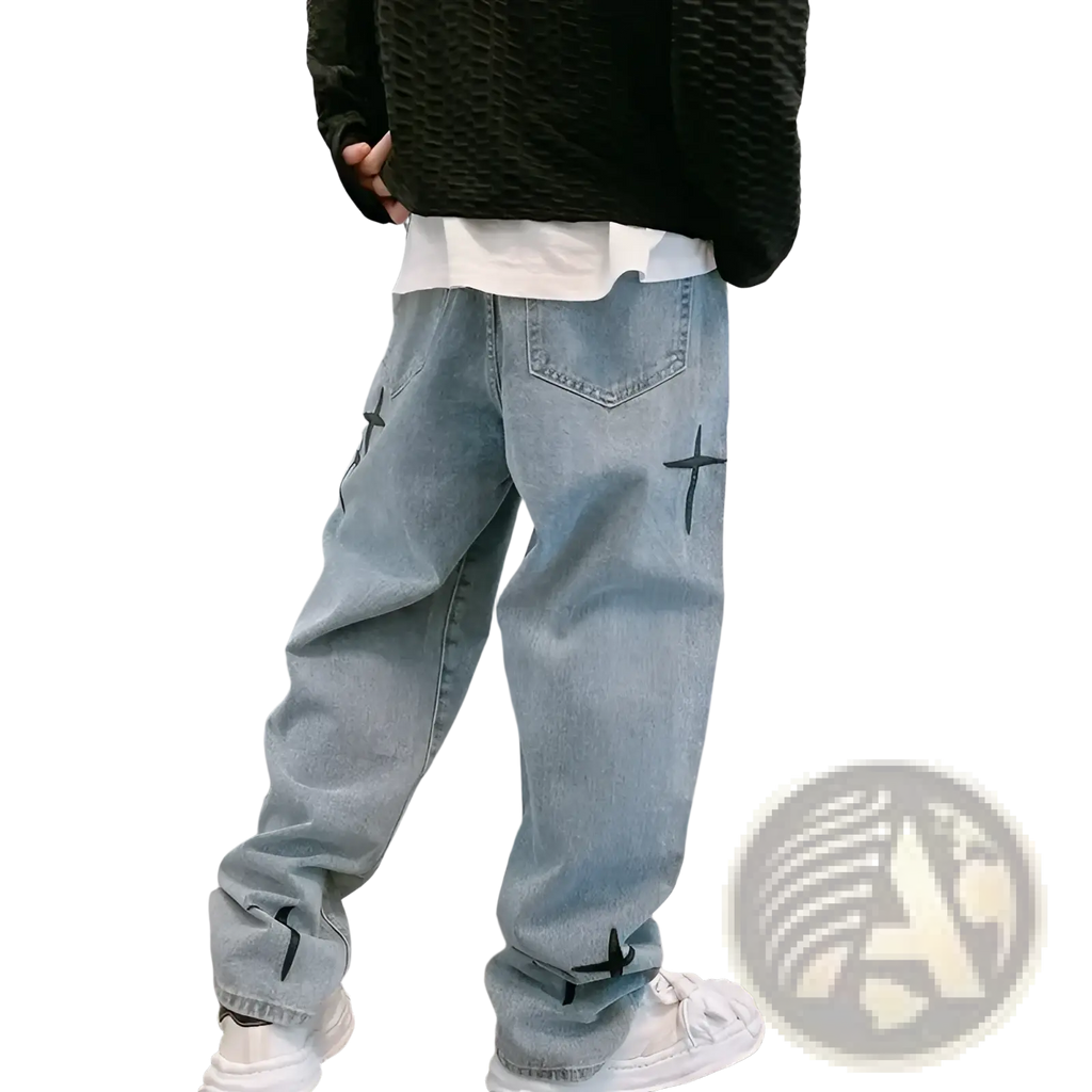 Light-wash denim baggy wide leg jeans with black cross embroidery on outer thighs and cuffs