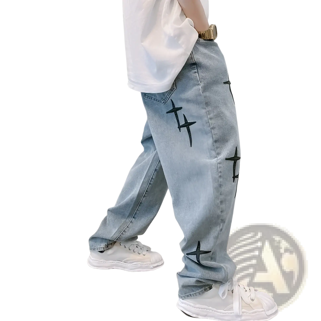 Light-wash denim cross embroidered wide leg cargo pants with black cross embroidery on the legs