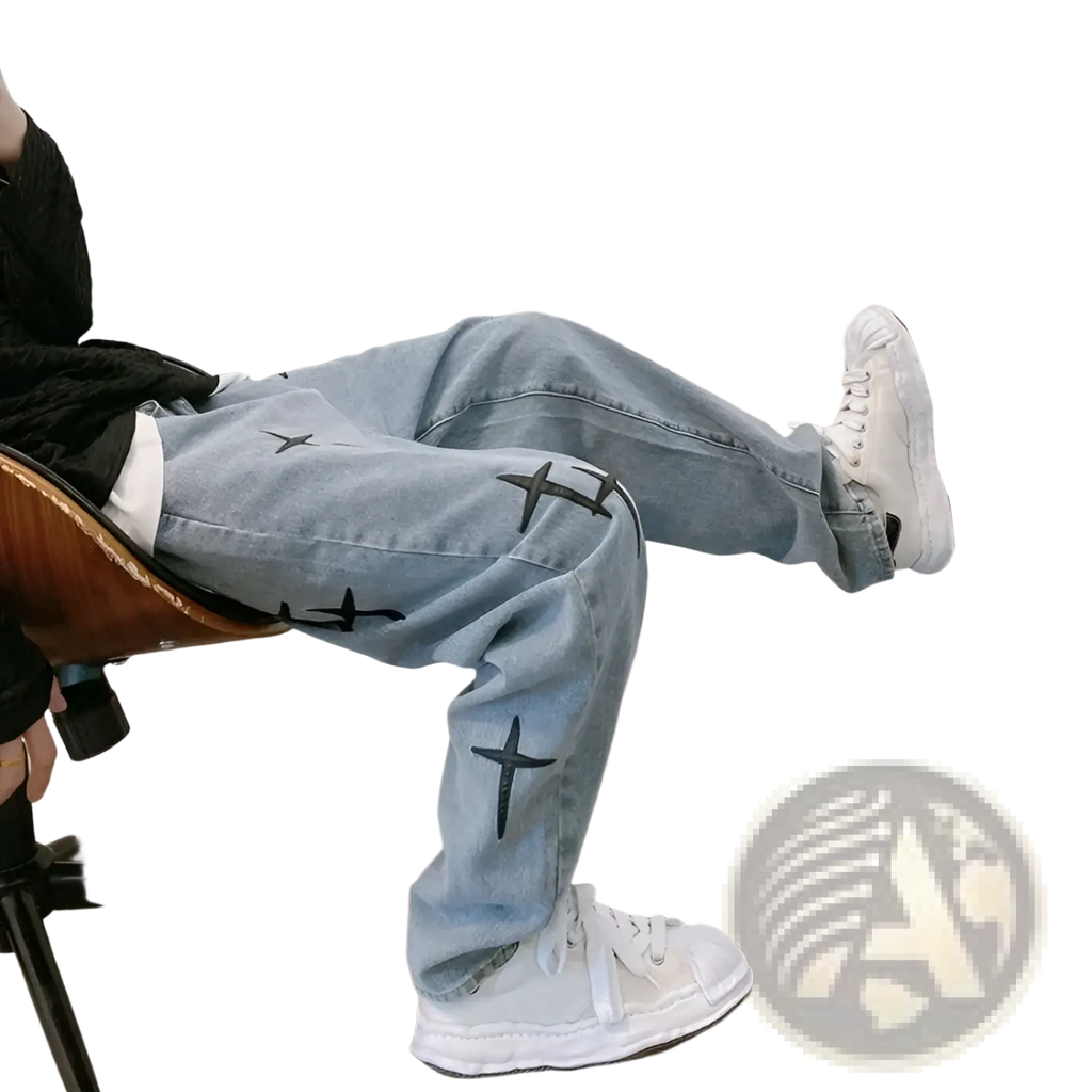 Light-wash denim cross embroidered wide leg cargo pants with black cross designs on the legs