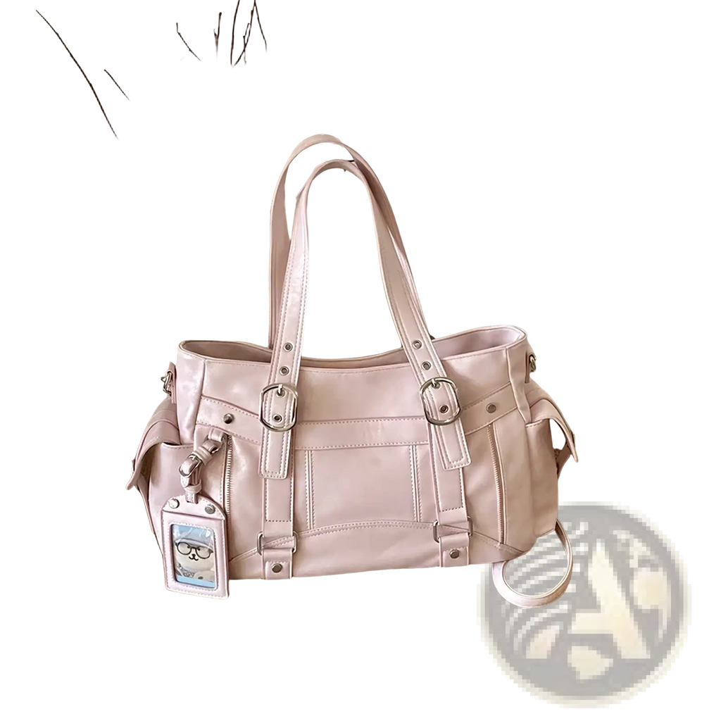 A blush pink faux leather crossbody bag with large capacity silver buckles and detachable shoulder strap for commuting